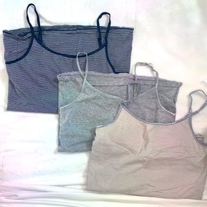 Three fitted stretchy tank tops